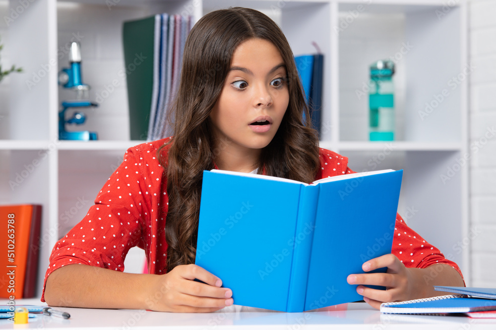 Back to school. Teenager school girl reading book ready to learn. Surprised face, surprise emotions of teenager girl. Back to school. Teenager school girl reading book ready to learn. Surprised face, surprise emotions of teenager girl.