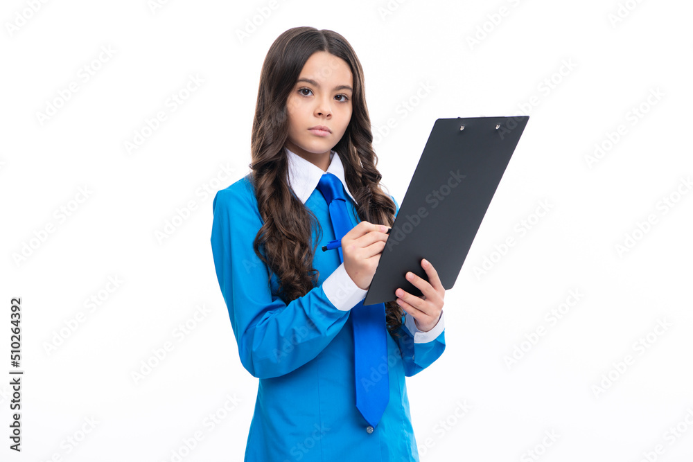 Portrait of cheerful young teen girl wearing office uniform holding clipboard on white isolated background. Portrait of cheerful young teen girl wearing office uniform holding clipboard on white isolated background.