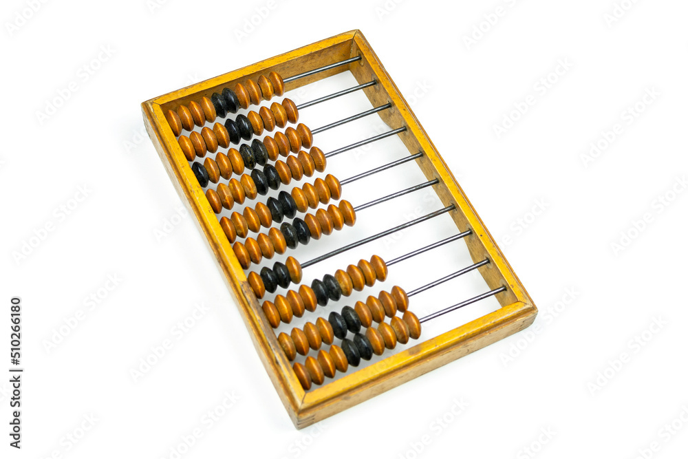 Old antique wooden abacus on a white isolated background. Business concept. Old antique wooden abacus on a white isolated background. Business concept.
