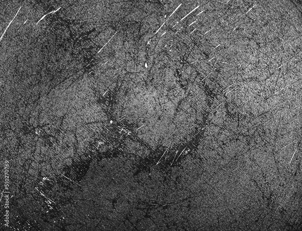 Grunge black texture. The texture of the scratches on the metal