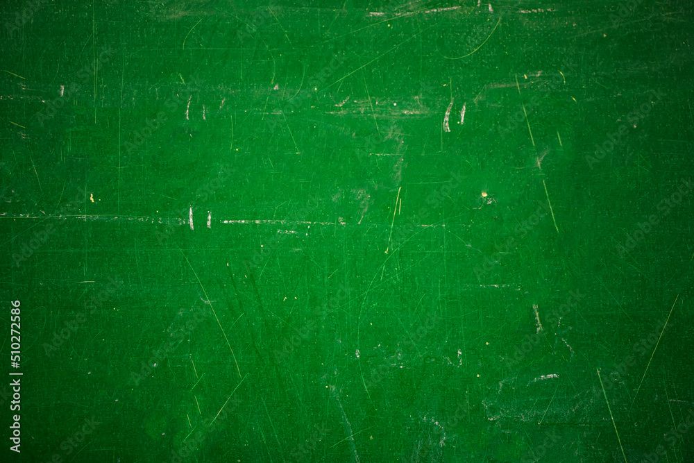 Green school board with scratches and scuffs. Green school board with scratches and scuffs.