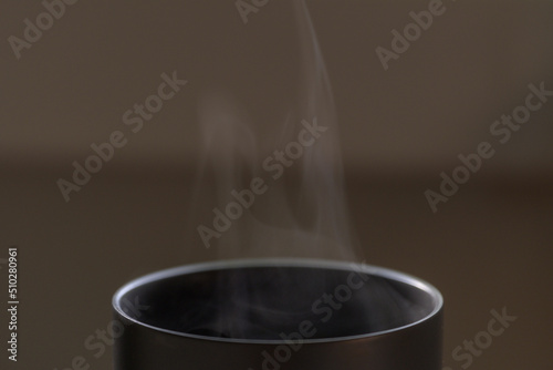 Steaming cup of coffee - horizontal