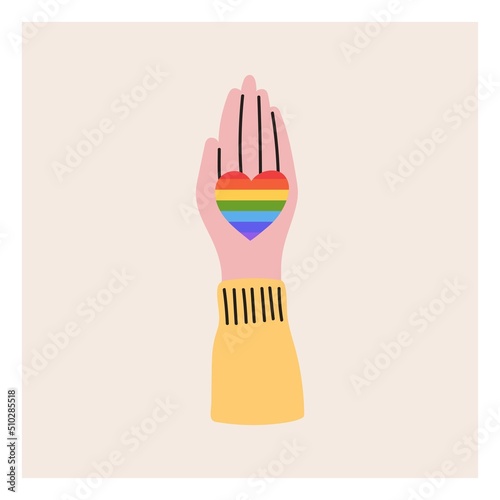 The hand holds the LGBT heart. Pride month, LGBT flag, rainbow. Flat vector illustration