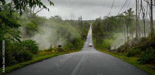 Rebuilt road that crosses a lava flow in the Leilani Estates neighborhood, destroyed during the volcanic eruption of the Fissure 8 near Hilo on the Big Island of Hawaii, USA photo