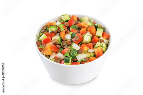 Lentil red bell pepper cucumber salad in a bowl on a white isolated background