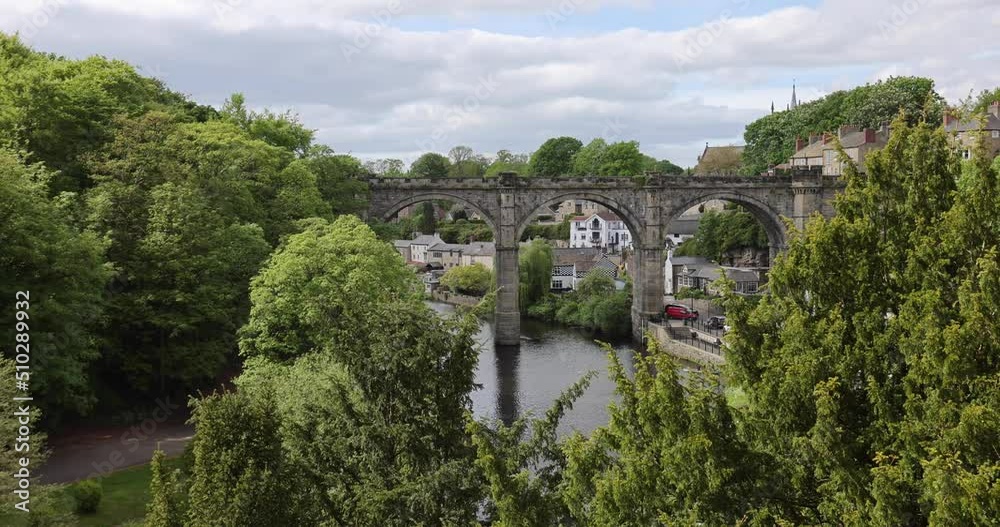 Trees swaying in the wind near Knaresborough viaduct on a cloudy summer day Trees swaying in the wind near Knaresborough viaduct on a cloudy summer day
