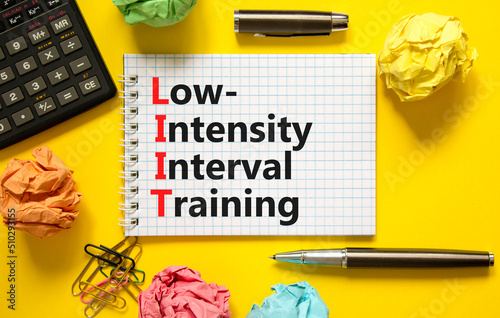 LIIT low-intensity interval training symbol. Concept words LIIT low-intensity interval training on a beautiful yellow background. LIIT low-intensity interval training concept. Copy space. photo