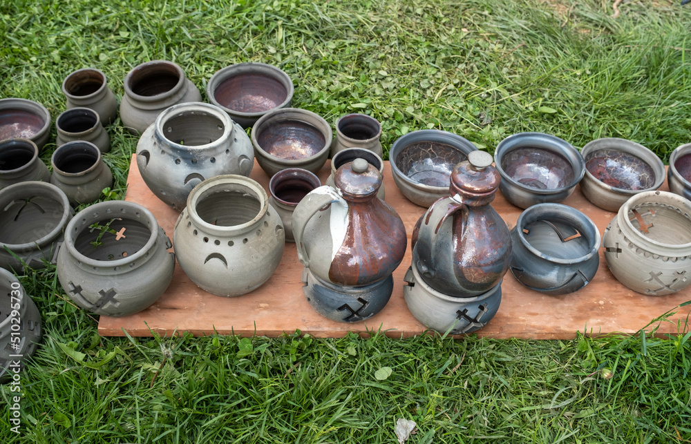 fired earthenware removed from the kiln. Mugs, pots, plates and everything else beautiful and useful. Latvian national cultural heritage fired earthenware removed from the kiln. Mugs, pots, plates and everything else beautiful and useful. Latvian national cultural heritage