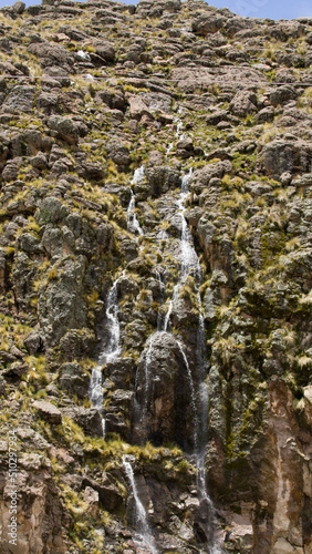 small Water fall down rocky cliff - Apurimac Peru photo