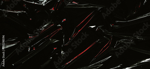 Fotografi Transparent plastic wrap on black background