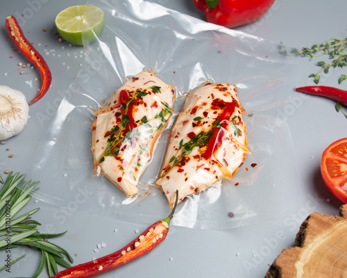 Vacuumed chicken fillet in chili