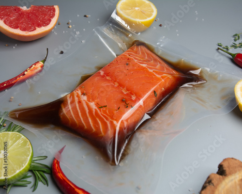 Vacuumed salmon in sous vide 