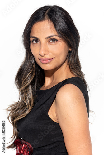 Studio images of beautiful Asian Indian woman in a black dress.