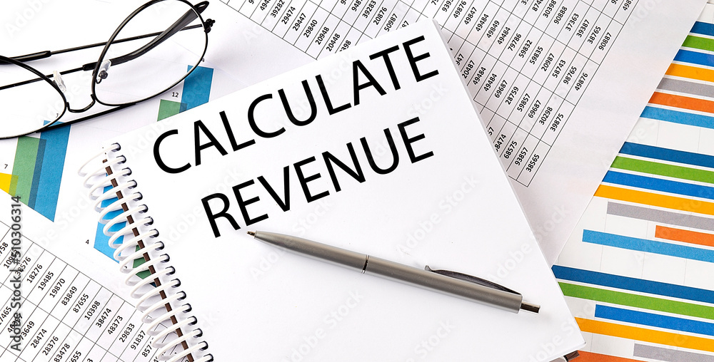 Notebook with text CALCULATE REVENUE . Diagram and white background,Business concept Notebook with text CALCULATE REVENUE . Diagram and white background,Business concept