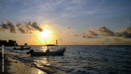 fishing boat in the sunrise