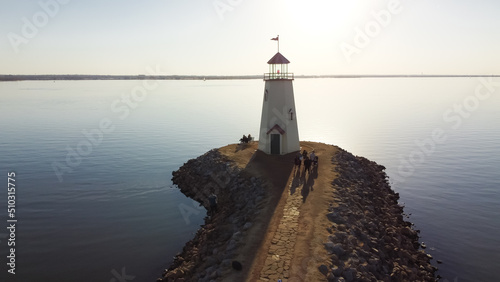 Sunset over Lighthouse at East Wharf on Lake Hefner, Oklahoma City, Oklahoma, USA in aerial view