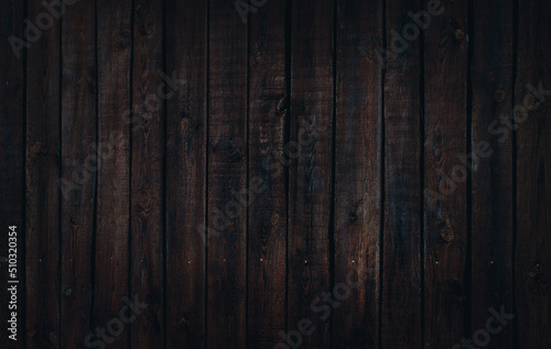 Wood dark texture. Texture for design and decoration. Natural wood background. Wooden fence. Surface with natural pattern. Space for floor. Abstract texture. Structure.
