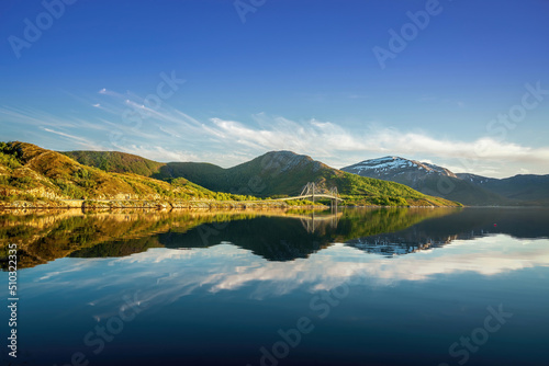 blue sky, silent waters, bridge, forests and mountains Fototapete