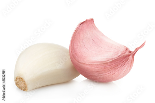 Two delicious garlic cloves, isolated on white background