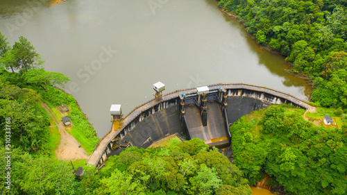 Water dam and reservoir lake, generating hydro electricity power renewable energy. Sri Lanka. © Alex Traveler