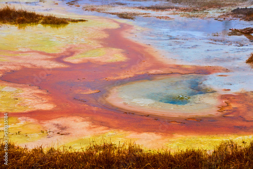 Stunning colorful pool of alkaline water in Yellowstone