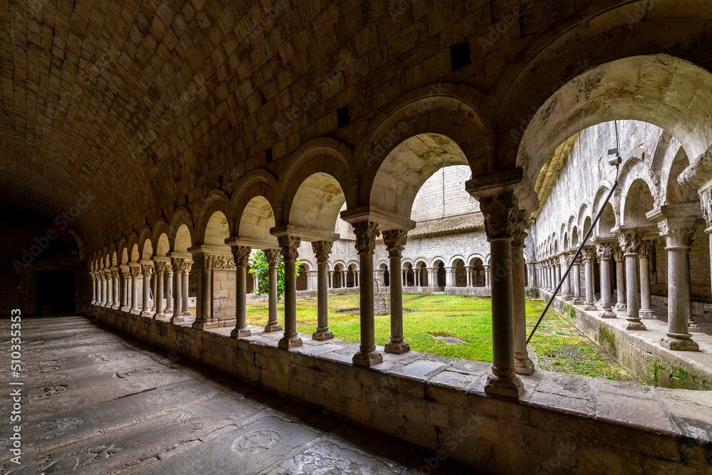 The inner courtyard, portico and arches inside the medieval Girona Cathedral in the Spanish town of Girona.