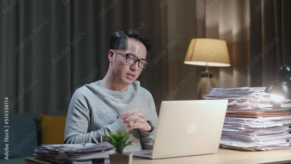 Asian Man Explaining Work While Having Video Call On Laptop At Home
Asian Man Explaining Work While Having Video Call On Laptop At Home