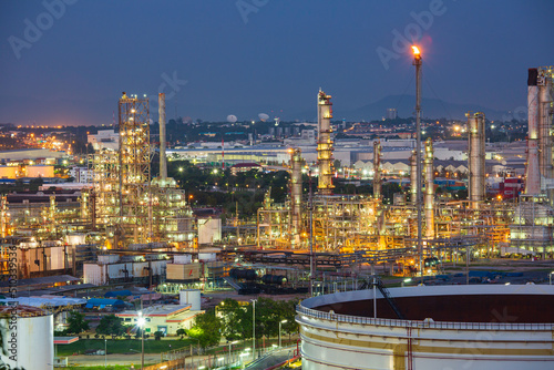 Tank crude oil scene of refinery plant and tower column of evening    sunset Petrochemistry industry