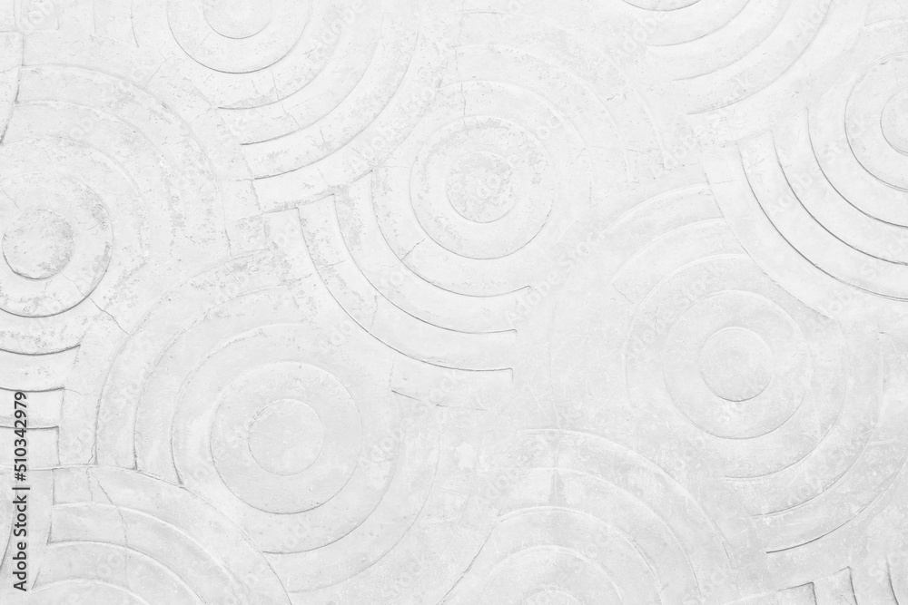 White concrete texture wall background. Abstract grey paint floor stamped concrete surface clean polished on walkway in garden. Wallpaper pattern curved circle . White concrete texture wall background. Abstract grey paint floor stamped concrete surface clean polished on walkway in garden. Wallpaper pattern curved circle .