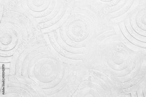 White concrete texture wall background. Abstract grey paint floor stamped concrete surface clean polished on walkway in garden. Wallpaper pattern curved circle .