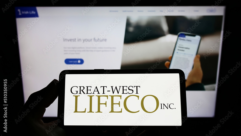 Stuttgart, Germany - 03-01-2022: Person holding mobile phone with logo of  Canadian insurance company Great-West Lifeco Inc. on screen in front of web  page. Focus on phone display. Stock-Foto | Adobe Stock