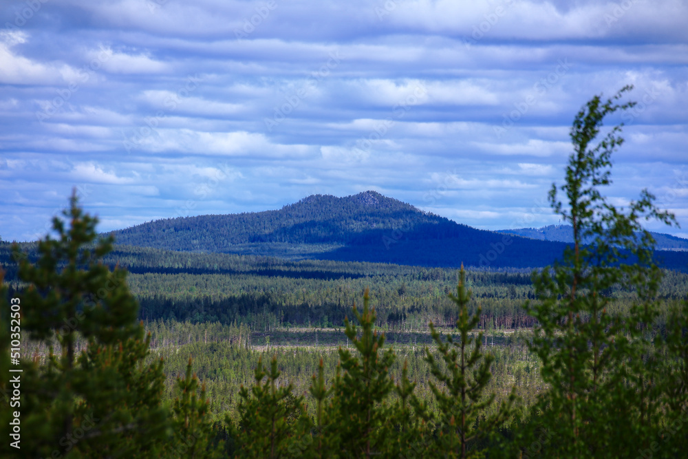 Scenic landscape with the small mountain Vithatten in northern Sweden