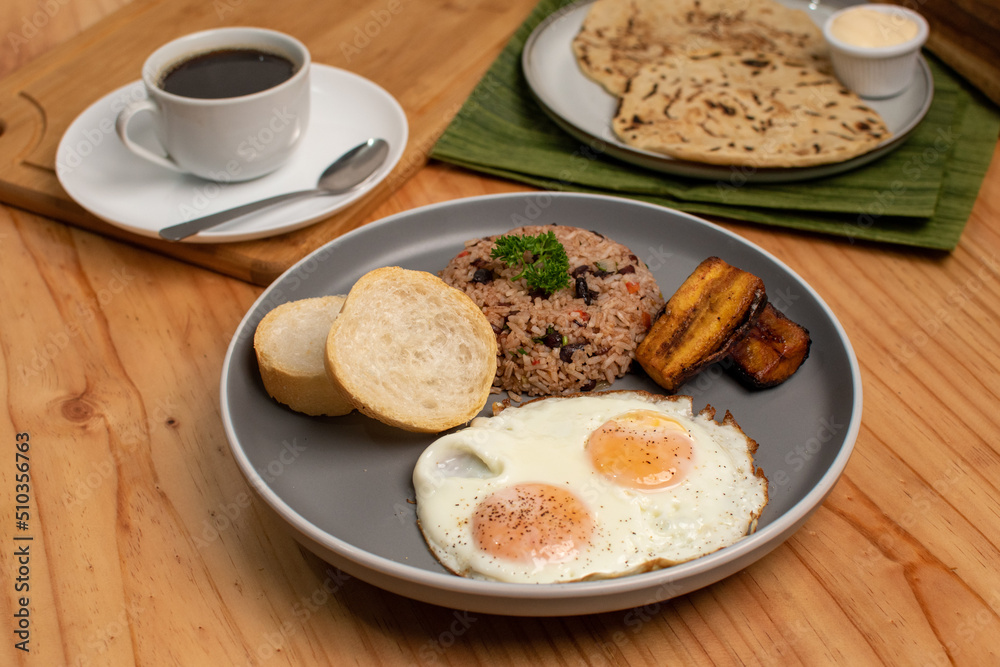 Gallo pinto costa rica traditional breakfast with black coffee and tortillas