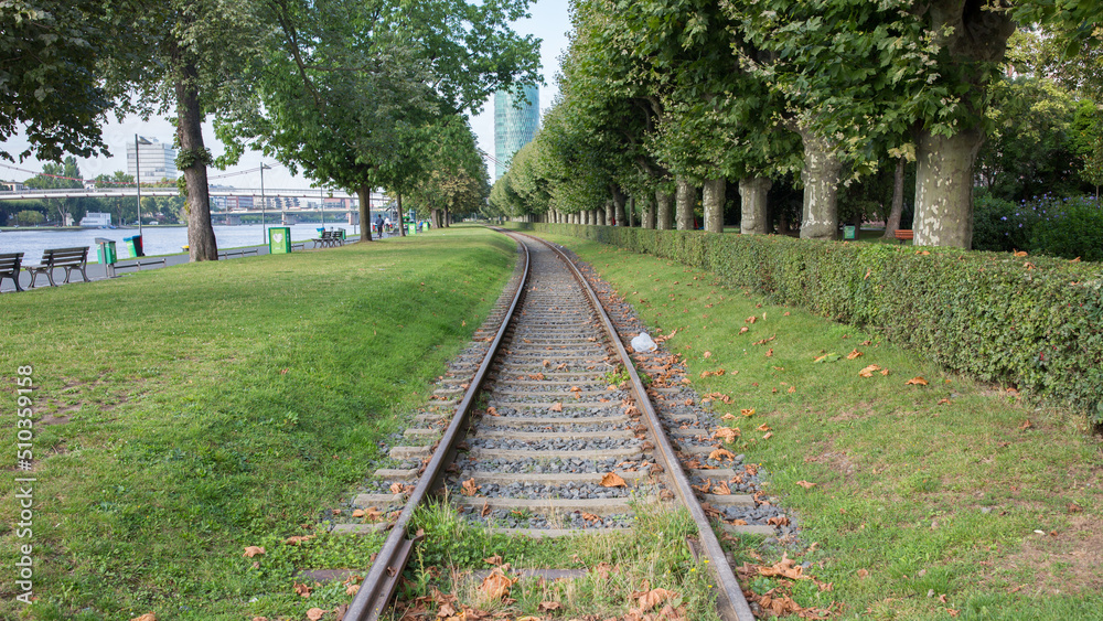 Fototapeta premium Railway tracks next to the Main river (Frankfurt am Main).