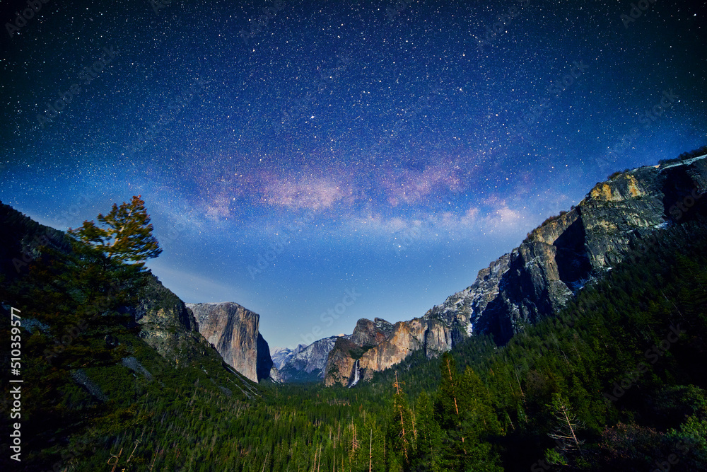 Stunning milky way night over Yosemite Valley view in California