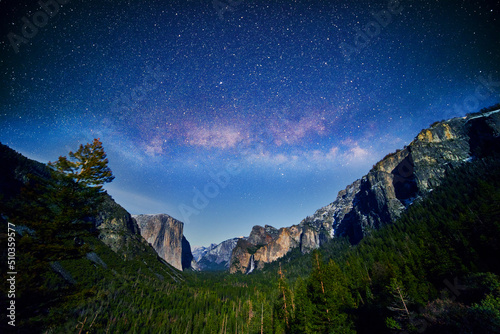 Stunning milky way night over Yosemite Valley view in California