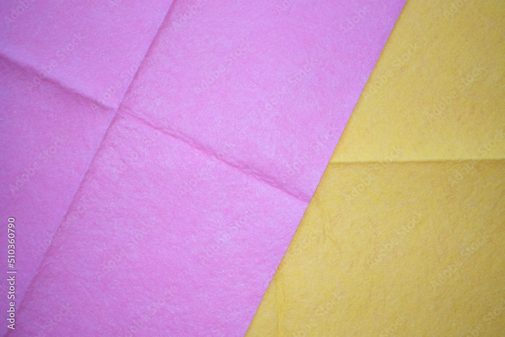 Fototapeta premium Yellow and pink dust cloth texture.