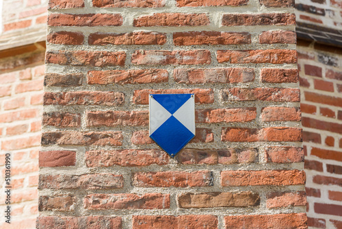 Denkmalschutz sign on the facade of a historical building in the old town of Landshut. Indicating that the building is a listed monument.