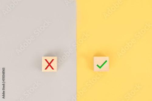 Free Download True and false or Yes or No symbols on wood blog on yellow and grey background. - GFXLoad
