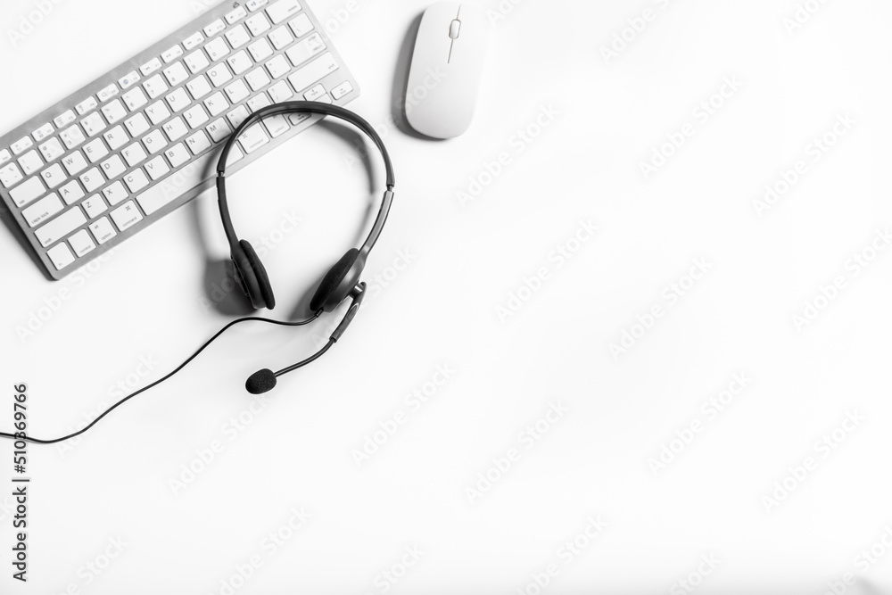 Headset and customer support equipment at call center ready for actively service , Communication support, call center and customer service help desk.for (call center) concept . Headset and customer support equipment at call center ready for actively service , Communication support, call center and customer service help desk.for (call center) concept .