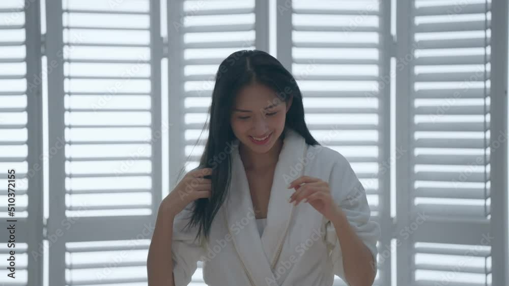 young black long hair woman wearing a bathrobe young black long hair woman wearing a bathrobe