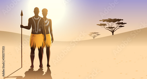 African aborigine man and woman with traditional body art and ethnic dress, standing on a sunny sandy landscape background and holding a spear. Massai tribe couple vector illustration. photo