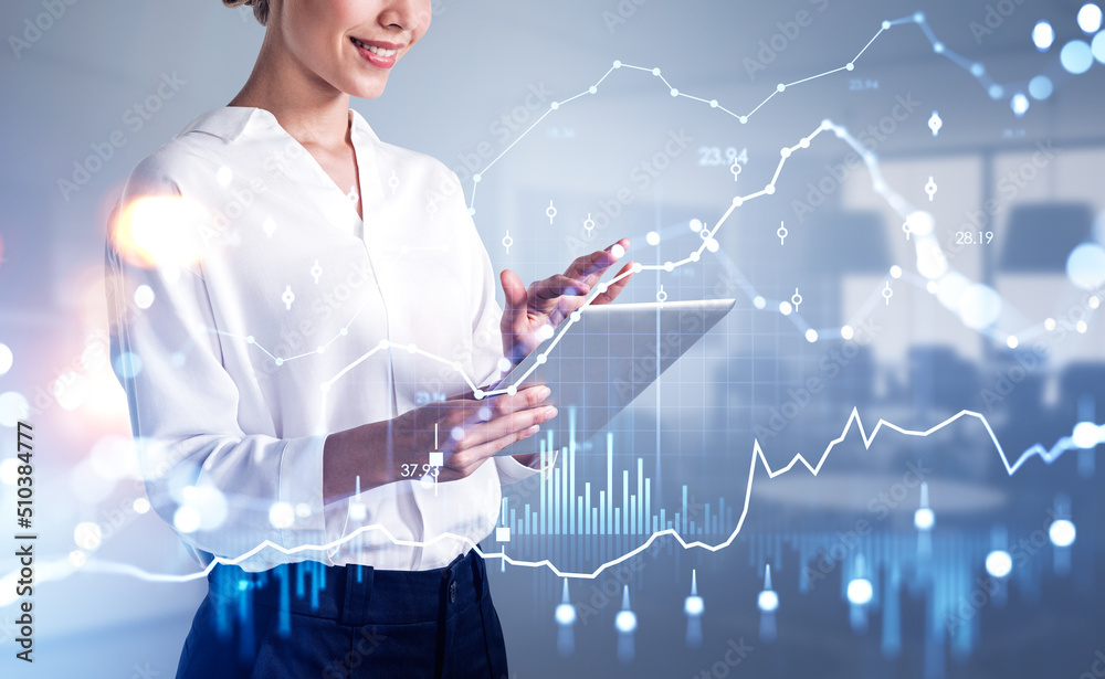 Businesswoman with tablet in hands, forex chart and office room Businesswoman with tablet in hands, forex chart and office room