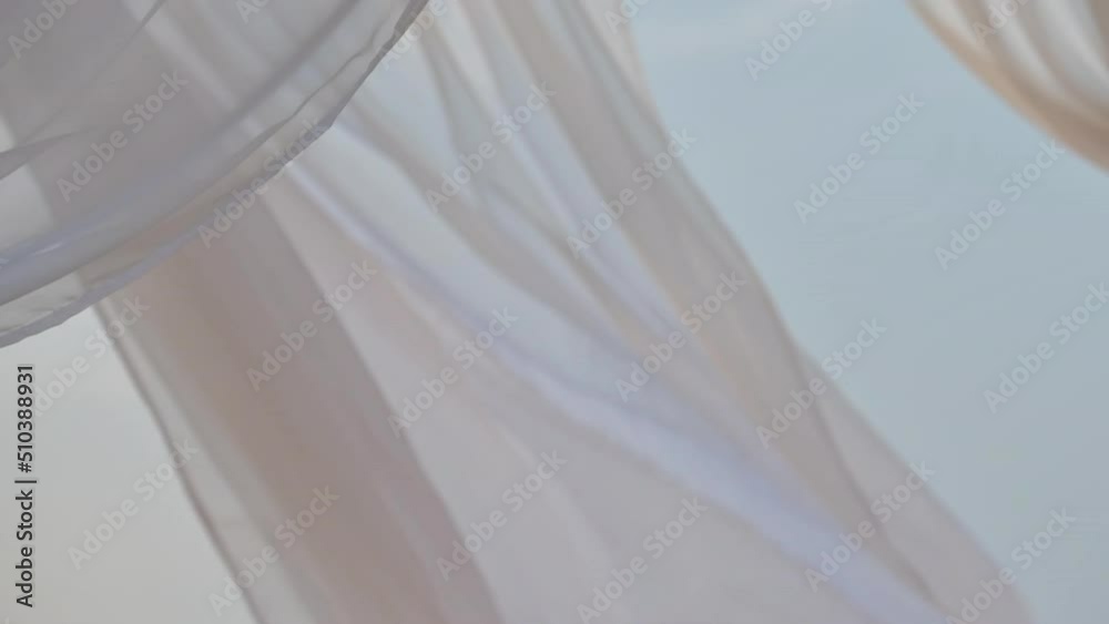 White pergola curtains at seaside, slow motion White pergola curtains at seaside, slow motion