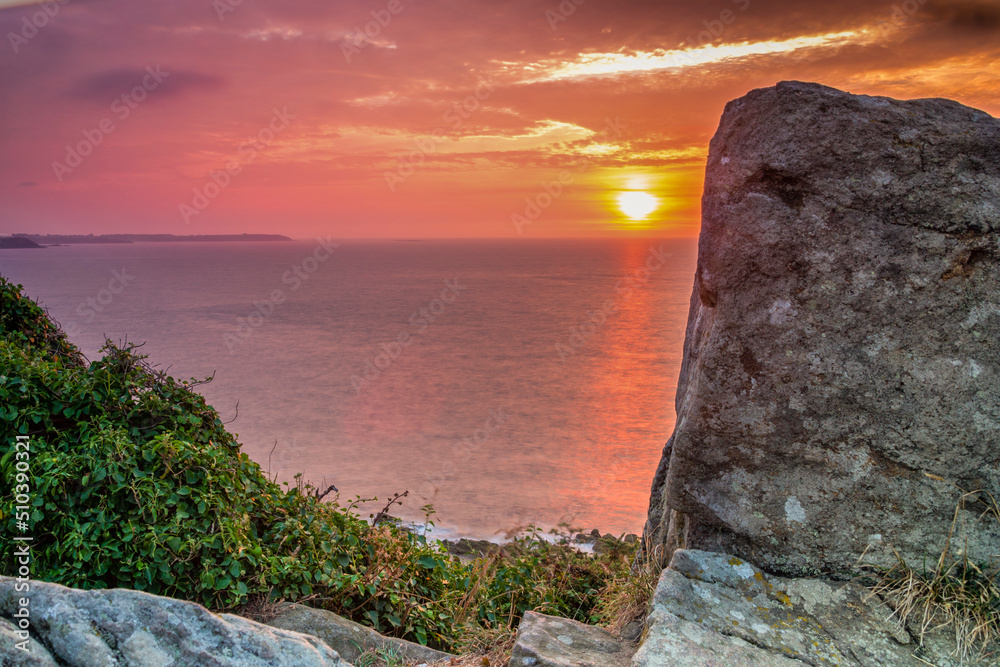 Coucher de soleil en bretagne à la pointe du Grouin Stock Photo | Adobe