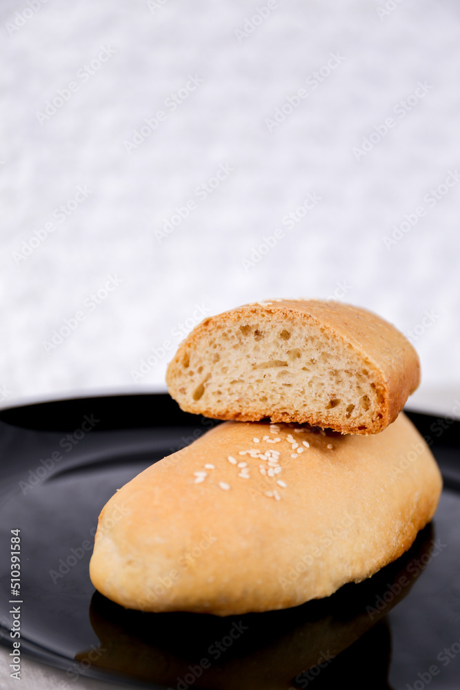Milk Plain Long John buns bread with copy space for text	
