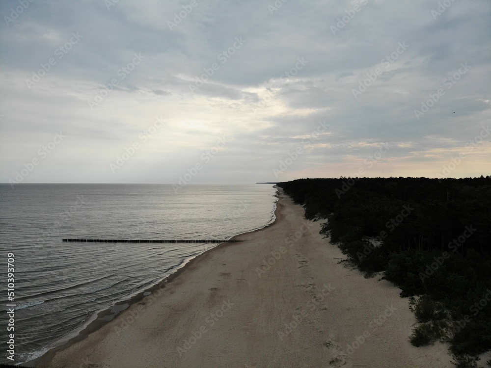 Ostsee - Polen - Strand - Sonnenuntergang - Möven - Wasser Ostsee - Polen - Strand - Sonnenuntergang - Möven - Wasser