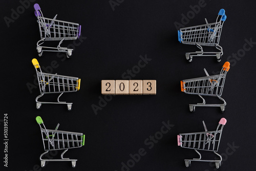 New Year 2023 Creative Design Concept with Shopping trolley
