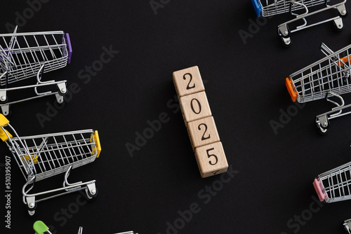 New Year 2025 Creative Design Concept with Shopping trolley