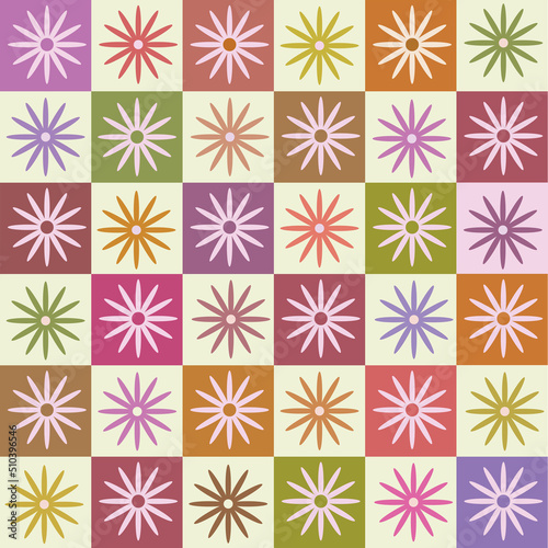 Cute daisy flowers seamless pattern on multicolored checkerboards. For textile, stationary and wrapping paper 